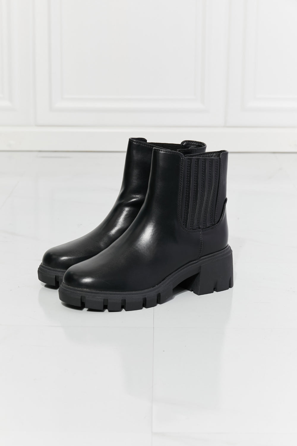 What It Takes Lug Sole Chelsea Boots in Black